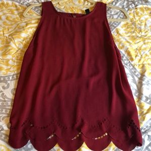 Scalloped bottom tank